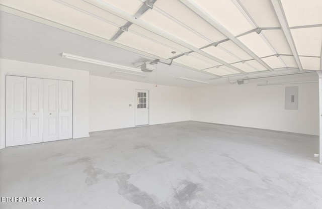 674 Southview Cir, Kodak, TN 37764 - garage featuring a garage door opener and electric panel