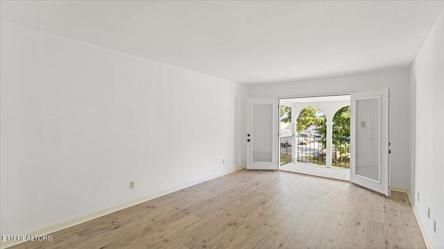 5709 Lyons View Pike Unit 4307, Knoxville, TN 37919 - empty room with light wood-style floors and baseboards
