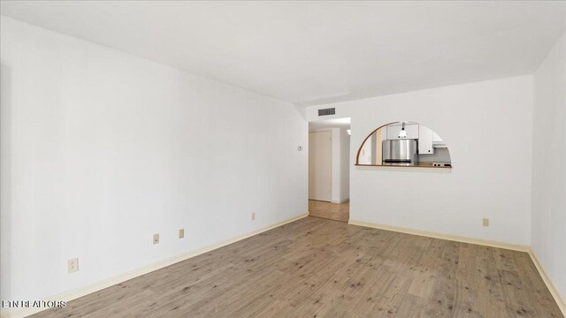 5709 Lyons View Pike Unit 4307, Knoxville, TN 37919 - unfurnished room featuring light wood-style floors and baseboards