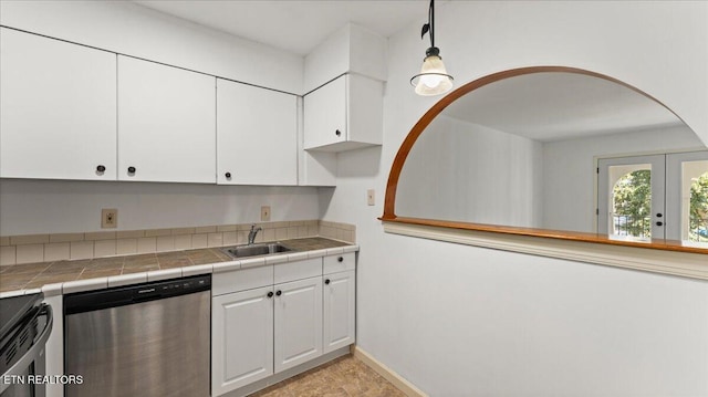 5709 Lyons View Pike Unit 4307, Knoxville, TN 37919 - kitchen featuring dishwasher, white cabinetry, range, and pendant lighting