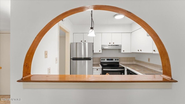 5709 Lyons View Pike Unit 4307, Knoxville, TN 37919 - kitchen featuring appliances with stainless steel finishes, under cabinet range hood, white cabinetry, pendant lighting, and light countertops