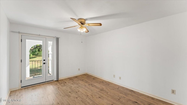 5709 Lyons View Pike Unit 4307, Knoxville, TN 37919 - unfurnished room with wood finished floors and a ceiling fan