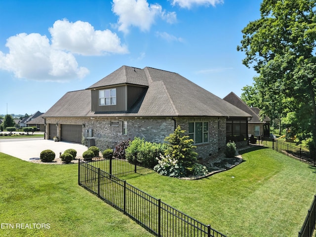 1439 St Thomas Way, Alcoa, TN 37701 - view of home's exterior with concrete driveway, a garage, brick siding, and roof with shingles
