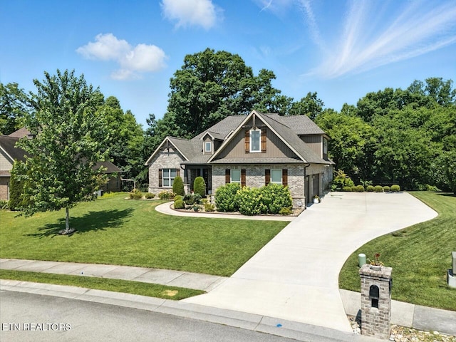 1439 St Thomas Way, Alcoa, TN 37701 - craftsman house with a front yard, driveway, stone siding, a garage, and brick siding