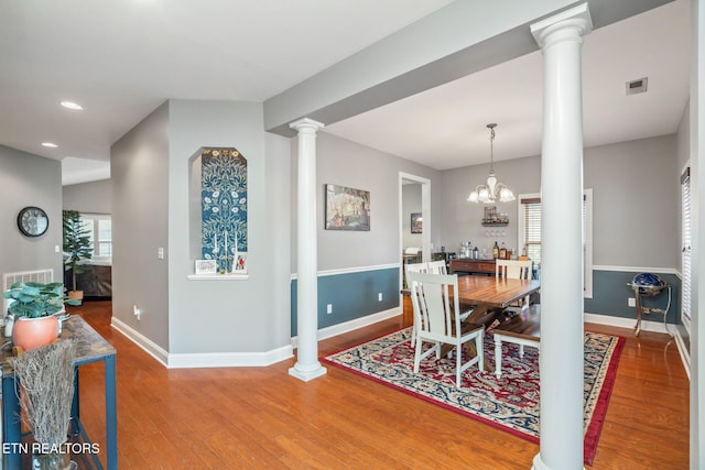 121 Fallberry St, Oak Ridge, TN 37830 - dining area with ornate columns, wood finished floors, recessed lighting, and a chandelier