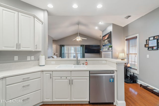 121 Fallberry St, Oak Ridge, TN 37830 - kitchen featuring dishwasher, white cabinets, vaulted ceiling, a ceiling fan, and wood finished floors