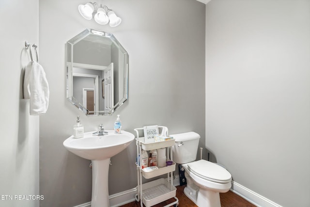 121 Fallberry St, Oak Ridge, TN 37830 - bathroom with toilet and wood finished floors