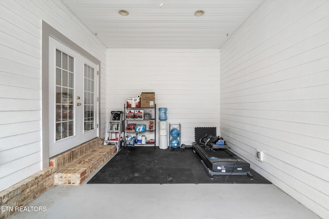 121 Fallberry St, Oak Ridge, TN 37830 - workout area with french doors and wooden walls