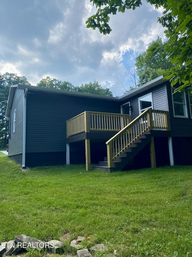 506 Snead Dr, Crossville, TN 38572 - rear view of house with a deck, a yard, and stairs