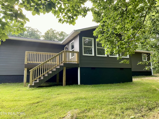506 Snead Dr, Crossville, TN 38572 - back of house featuring crawl space, stairway, a yard, and a deck