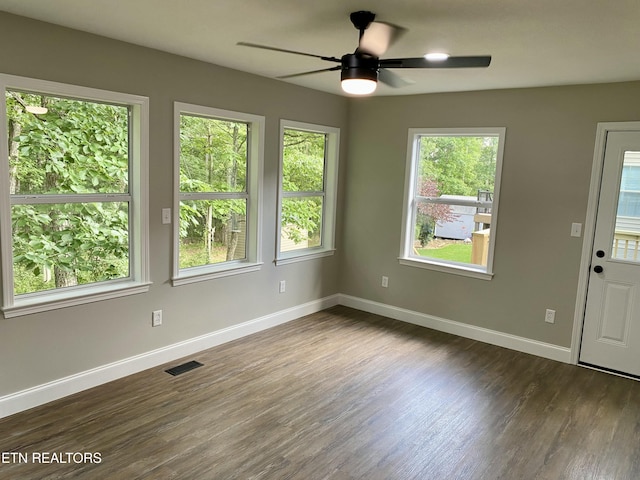 506 Snead Dr, Crossville, TN 38572 - unfurnished room with dark wood-style flooring and a ceiling fan