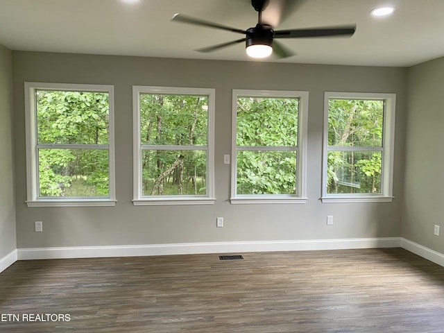 506 Snead Dr, Crossville, TN 38572 - empty room featuring healthy amount of natural light, ceiling fan, dark wood-style floors, and recessed lighting