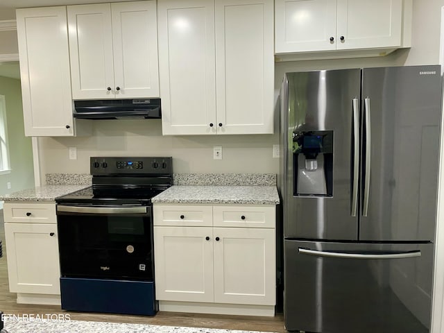 506 Snead Dr, Crossville, TN 38572 - kitchen featuring stainless steel fridge, black range with electric stovetop, under cabinet range hood, white cabinets, and light wood-style flooring