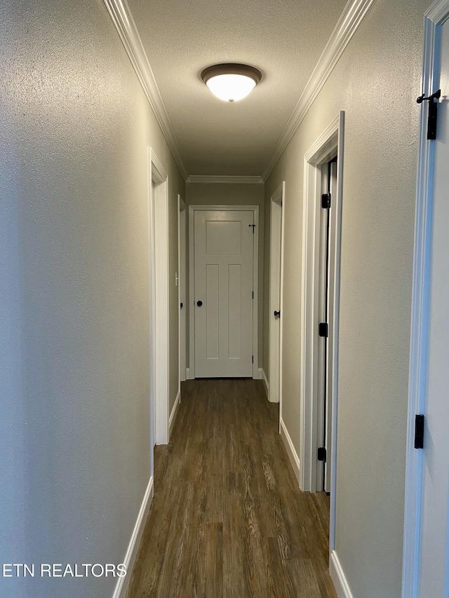506 Snead Dr, Crossville, TN 38572 - hall featuring dark wood-style floors, crown molding, and a textured ceiling