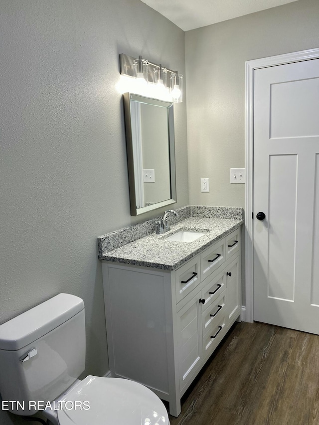 506 Snead Dr, Crossville, TN 38572 - half bath featuring wood finished floors and vanity