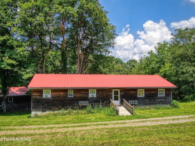 3636 Pickett Park Hwy, Jamestown, TN 38556 - view of front of home featuring entry steps, a front lawn, and a metal roof