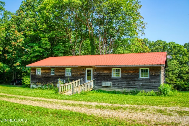 3636 Pickett Park Hwy, Jamestown, TN 38556 - view of front facade with a front yard, a metal roof, and entry steps