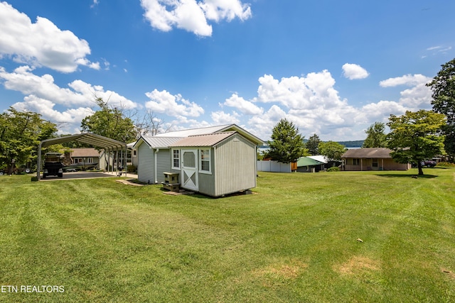 1595 Wa Ni Village Rd, Rutledge, TN 37861 - view of grassy yard with a carport and an outbuilding