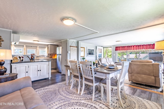 1595 Wa Ni Village Rd, Rutledge, TN 37861 - dining area with a textured ceiling and wood finished floors