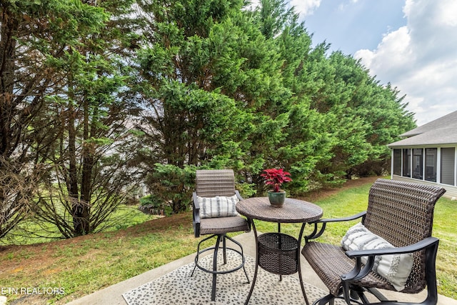 10867 Carpenter Run Ln Unit 44, Knoxville, TN 37932 - view of patio featuring a sunroom