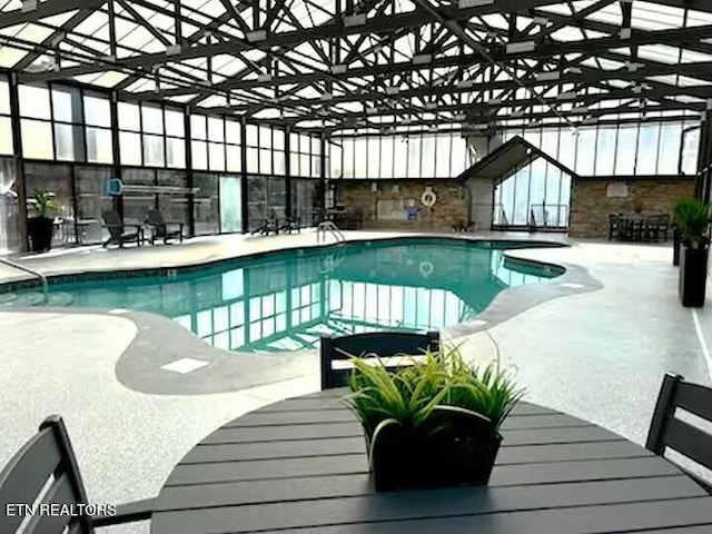 1507 Boo Boos Way, Sevierville, TN 37862 - indoor pool featuring a patio