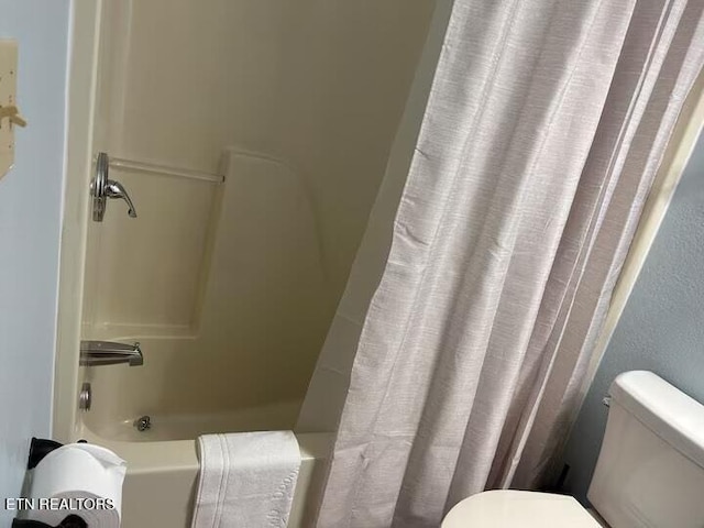 1507 Boo Boos Way, Sevierville, TN 37862 - bathroom with shower / bath combo with shower curtain