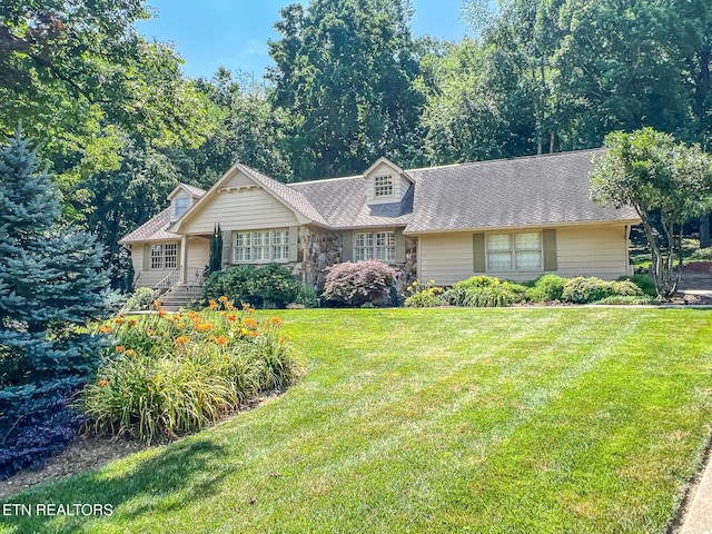 12218 Torrey Pines Pt, Knoxville, TN 37934 - view of front facade featuring a front lawn and stone siding