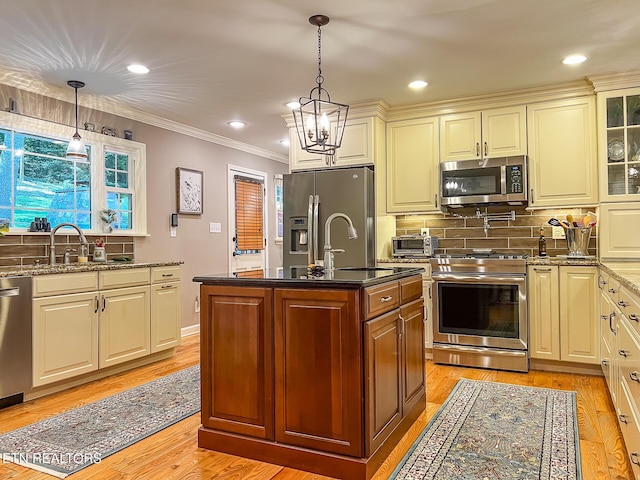 12218 Torrey Pines Pt, Knoxville, TN 37934 - kitchen featuring stainless steel appliances, crown molding, dark stone counters, tasteful backsplash, and glass insert cabinets
