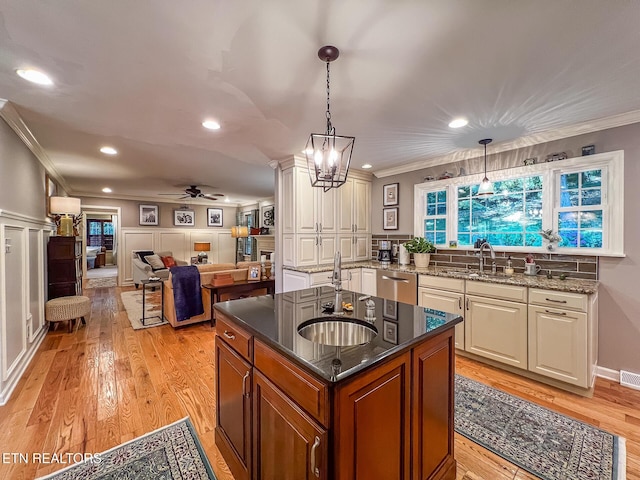 12218 Torrey Pines Pt, Knoxville, TN 37934 - kitchen featuring crown molding, ceiling fan, stainless steel dishwasher, dark stone countertops, and recessed lighting