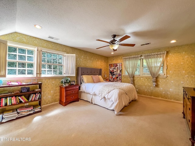 12218 Torrey Pines Pt, Knoxville, TN 37934 - bedroom featuring carpet floors, multiple windows, wallpapered walls, a textured ceiling, and ceiling fan