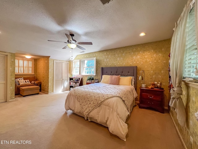 12218 Torrey Pines Pt, Knoxville, TN 37934 - bedroom with carpet, wallpapered walls, ceiling fan, and a textured ceiling