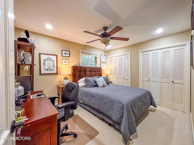 12218 Torrey Pines Pt, Knoxville, TN 37934 - bedroom with a desk, two closets, carpet flooring, recessed lighting, and a ceiling fan