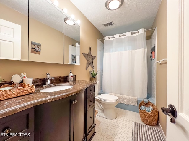 12218 Torrey Pines Pt, Knoxville, TN 37934 - bathroom featuring vanity, shower / tub combo, a textured ceiling, and tile patterned floors