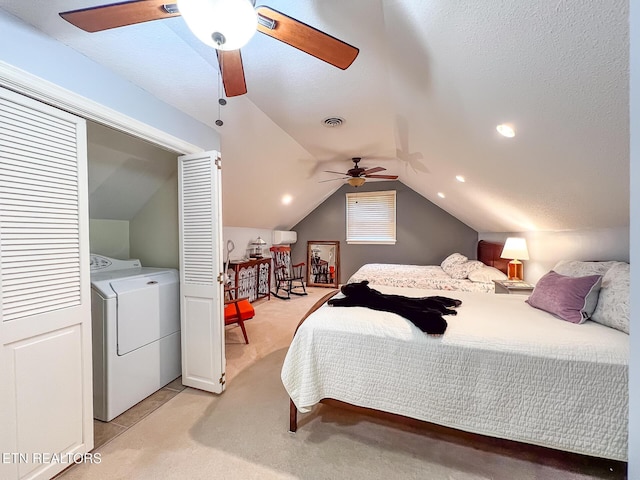 12218 Torrey Pines Pt, Knoxville, TN 37934 - bedroom featuring light carpet, vaulted ceiling, a ceiling fan, and separate washer and dryer
