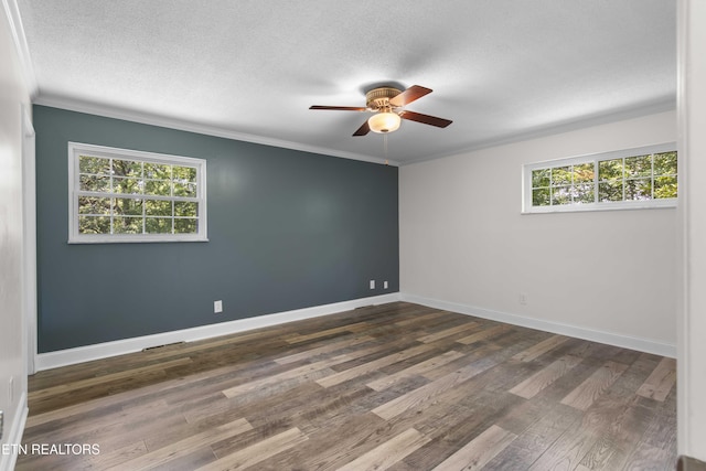 101 Concord Rd, Oak Ridge, TN 37830 - unfurnished room featuring a ceiling fan, crown molding, dark wood-style flooring, and a textured ceiling