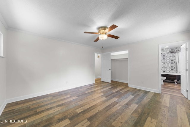 101 Concord Rd, Oak Ridge, TN 37830 - unfurnished bedroom featuring wood finished floors, crown molding, a closet, a ceiling fan, and ensuite bathroom