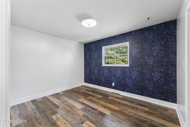 101 Concord Rd, Oak Ridge, TN 37830 - empty room featuring wallpapered walls and wood finished floors