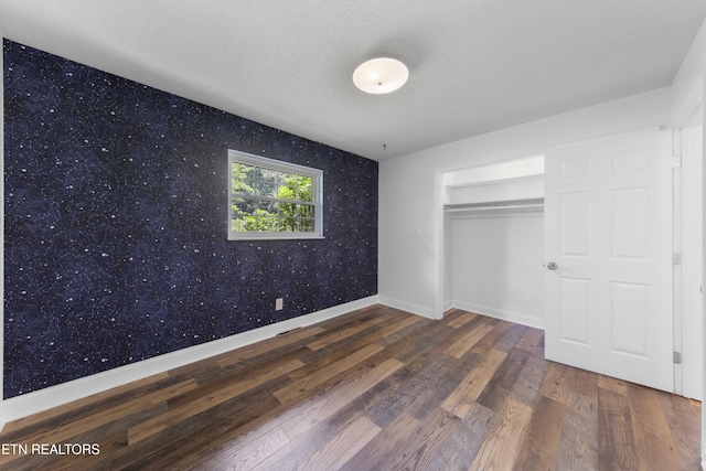 101 Concord Rd, Oak Ridge, TN 37830 - unfurnished bedroom featuring wallpapered walls and wood finished floors
