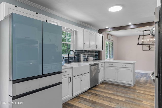 101 Concord Rd, Oak Ridge, TN 37830 - kitchen featuring fridge, stainless steel dishwasher, a peninsula, white cabinets, and dark wood finished floors