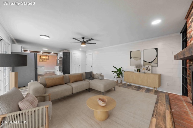 101 Concord Rd, Oak Ridge, TN 37830 - living area featuring ornamental molding, a brick fireplace, ceiling fan, wood finished floors, and recessed lighting