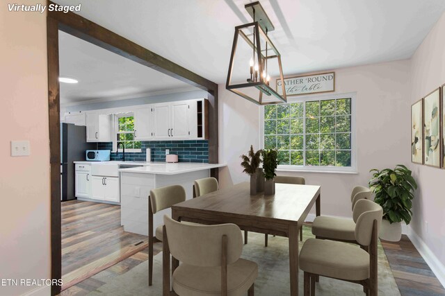 101 Concord Rd, Oak Ridge, TN 37830 - dining area featuring light wood-style flooring and a chandelier