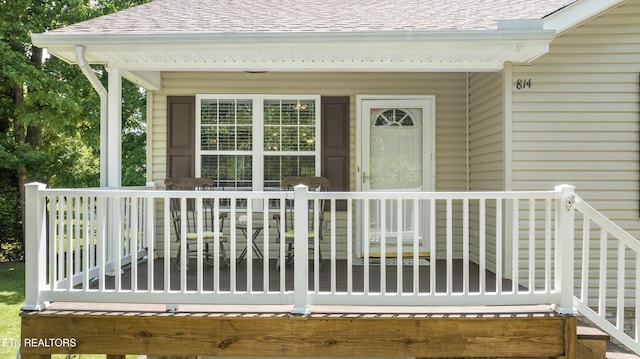 814 Plantation Dr, Pigeon Forge, TN 37863 - view of exterior entry with roof with shingles and a porch