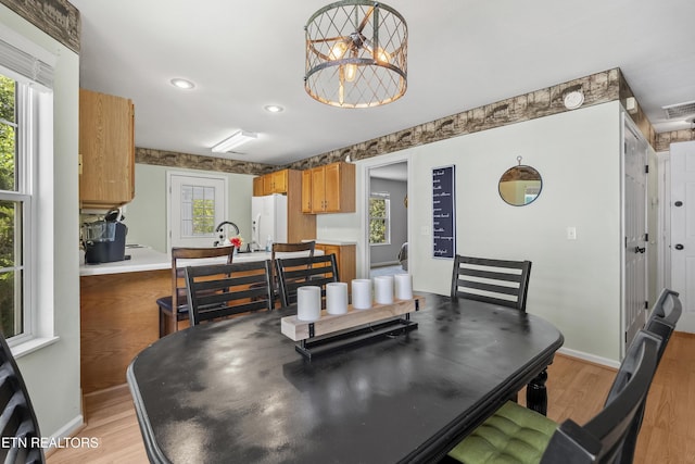 814 Plantation Dr, Pigeon Forge, TN 37863 - dining room with light wood-style floors, recessed lighting, and a chandelier