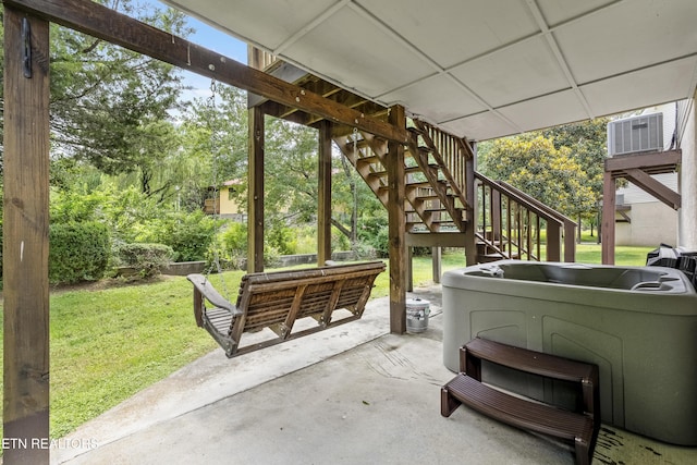 814 Plantation Dr, Pigeon Forge, TN 37863 - view of patio featuring stairway, a wall mounted air conditioner, and an outdoor hangout area