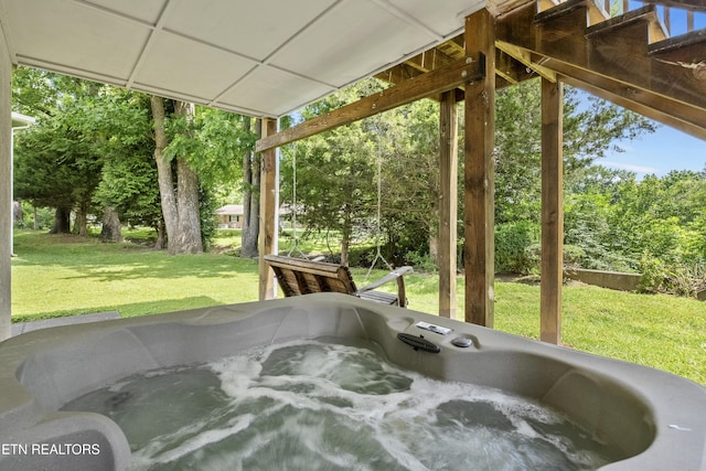 814 Plantation Dr, Pigeon Forge, TN 37863 - view of patio / terrace with a hot tub and view of scattered trees