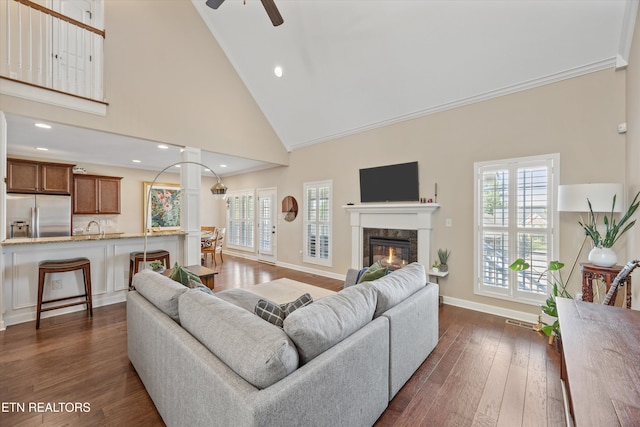 1213 Whisper Trace Ln, Knoxville, TN 37919 - living room with a fireplace, high vaulted ceiling, dark wood-style floors, a ceiling fan, and recessed lighting