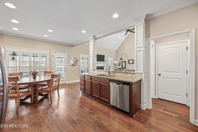 1213 Whisper Trace Ln, Knoxville, TN 37919 - kitchen with dishwasher, decorative columns, crown molding, dark wood-style floors, and light stone countertops