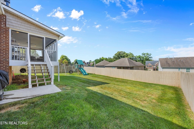 1213 Whisper Trace Ln, Knoxville, TN 37919 - fenced backyard featuring a sunroom and a playground