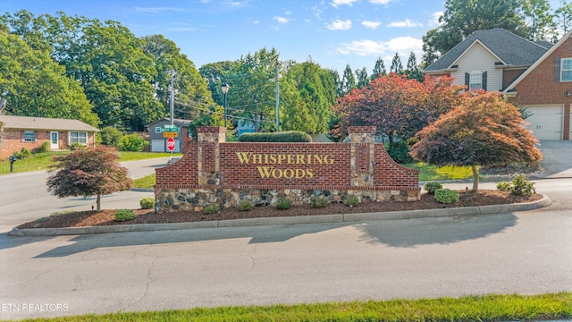 1213 Whisper Trace Ln, Knoxville, TN 37919 - community / neighborhood sign with driveway and a garage