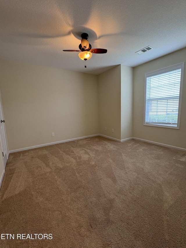8106 Spice Tree Way, Knoxville, TN 37931 - unfurnished room featuring carpet flooring, ceiling fan, and a textured ceiling